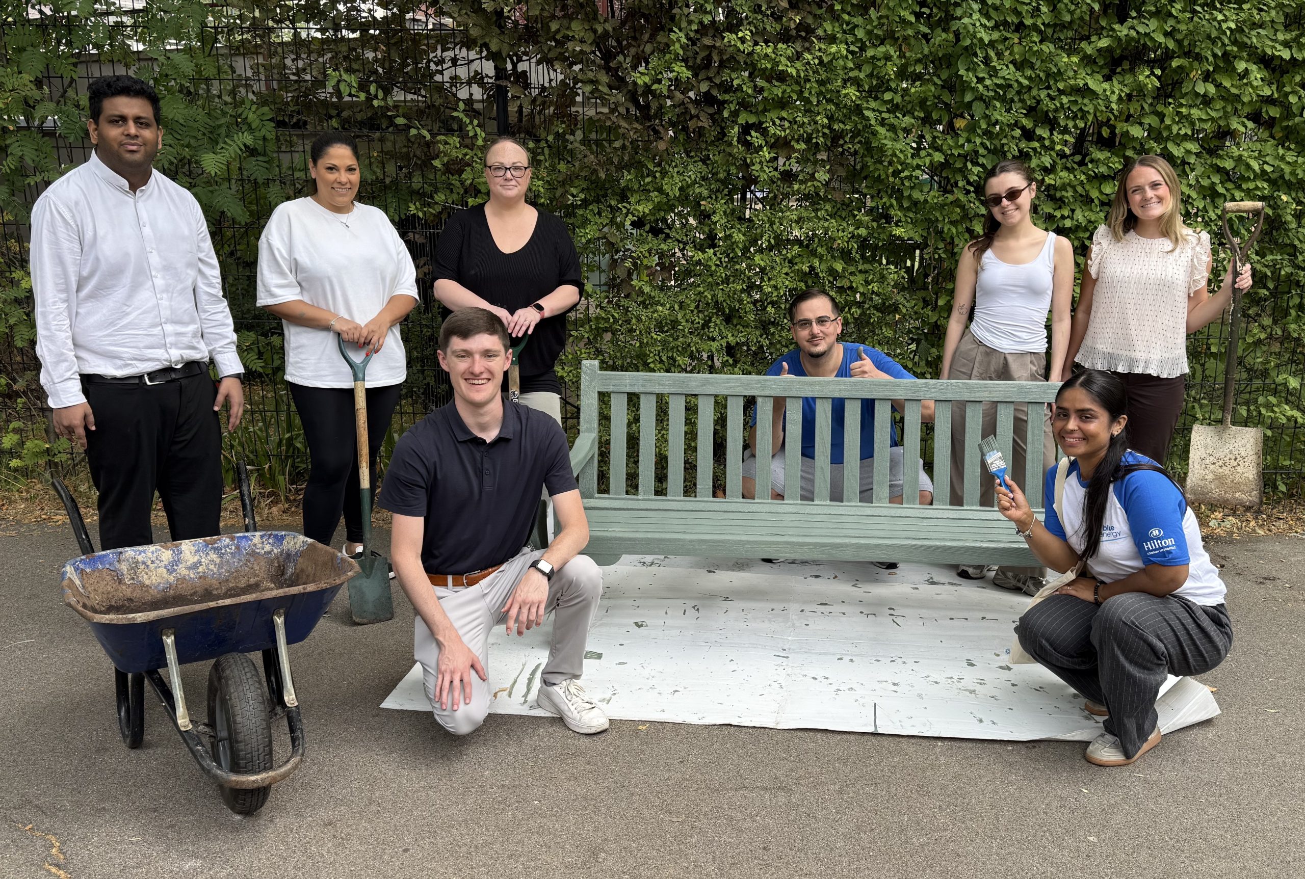 Hilton Volunteers Swap Desks for Paintbrushes and Wheelbarrows